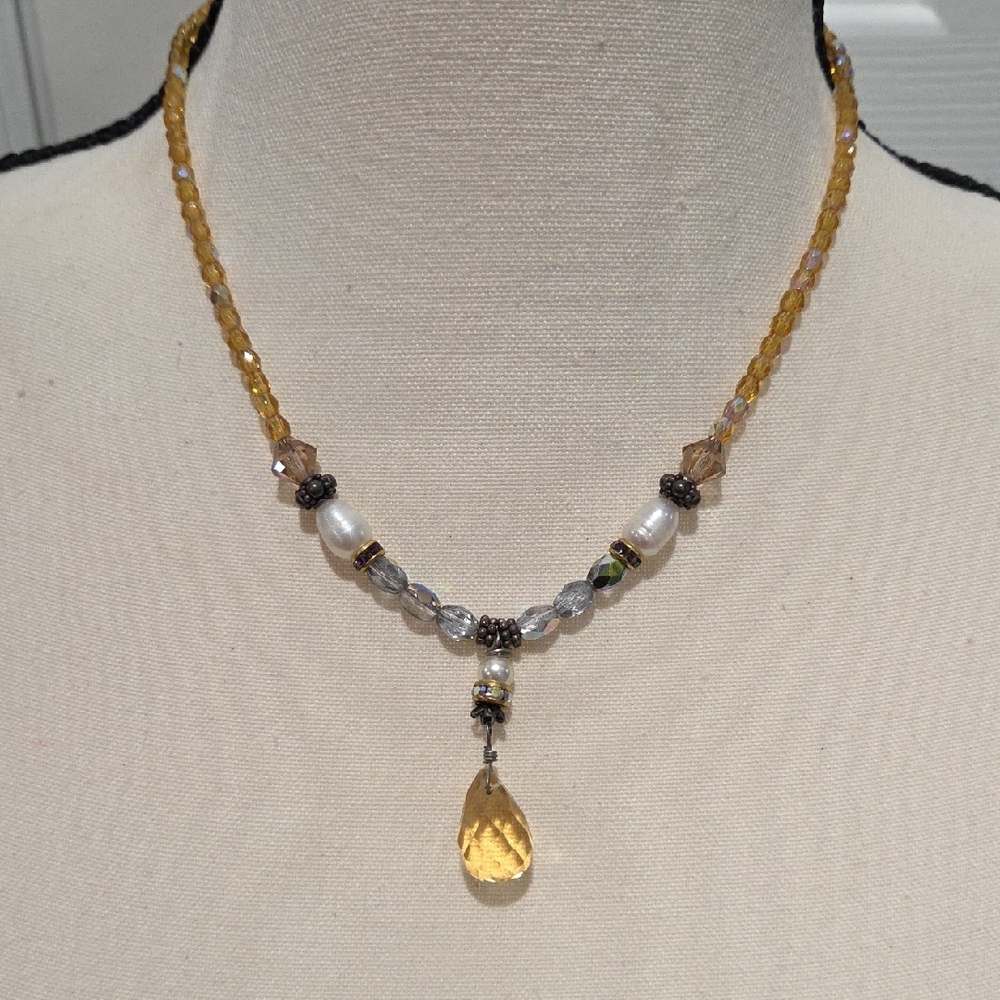 Vintage Elegant Beaded Necklace with Amber and Silver Accents